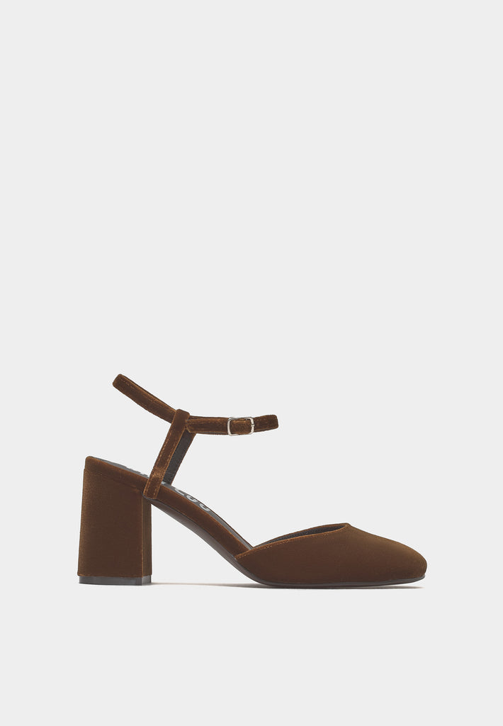 Side view of Bibi Lou Emily ocre velvet evening pump showing 90mm stiletto heel, ankle strap, and round toe design.