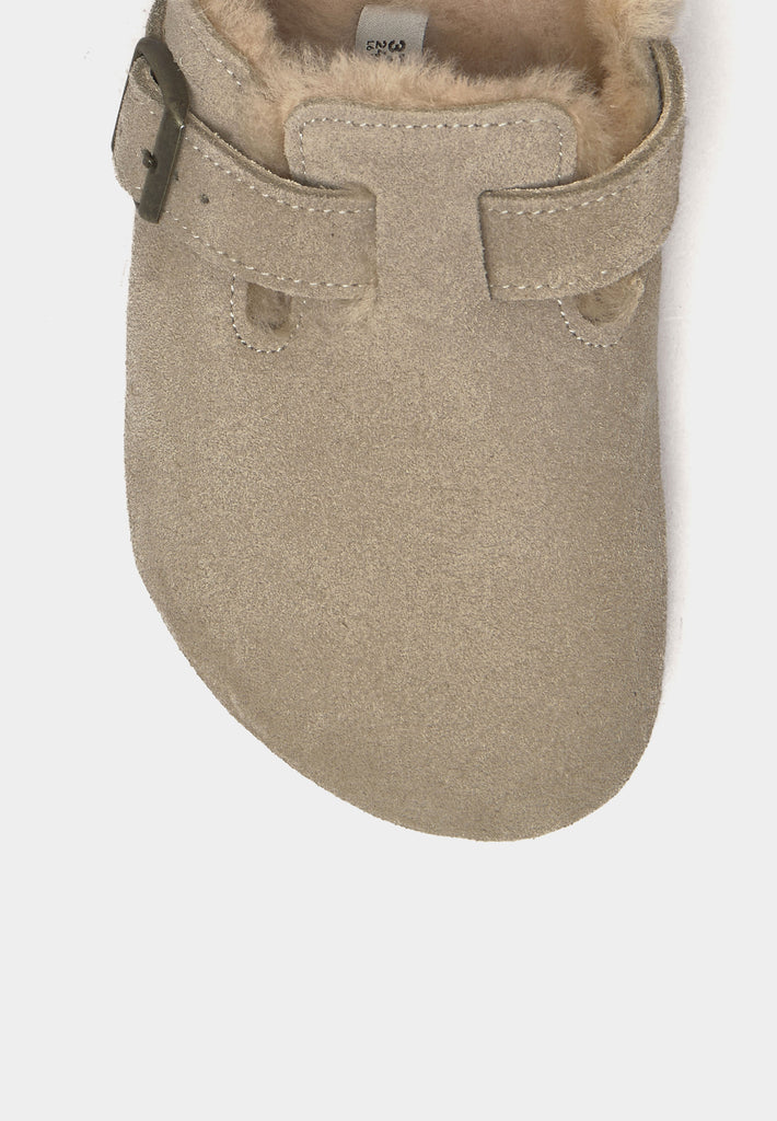 Close-up of Birkenstock Boston Shearling clog in Taupe showing metal buckle and warm lining.
